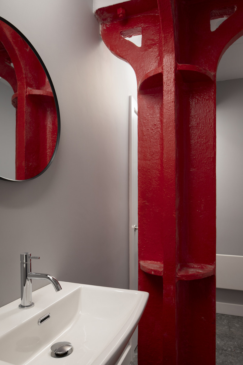 Existing Red Iron Column with a basin and chrome taps